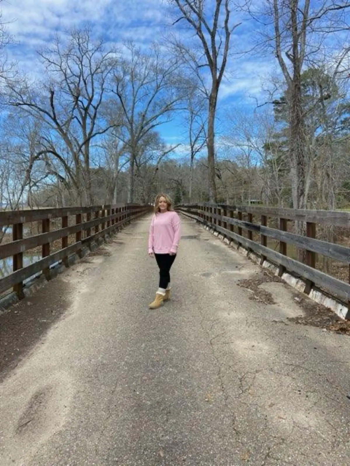 Walking the bridge over Como Bayou