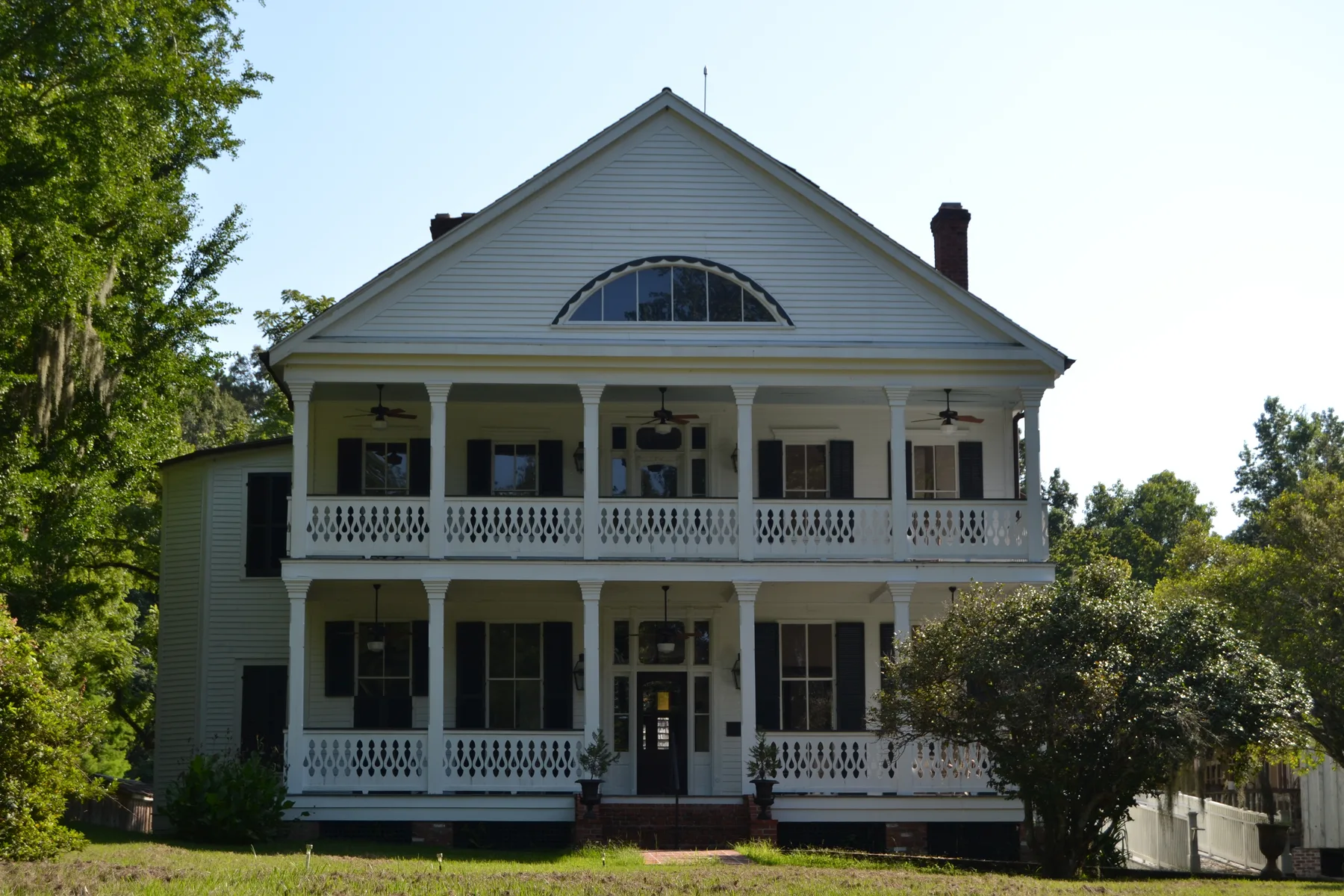 The full facade of the restored 1890 home