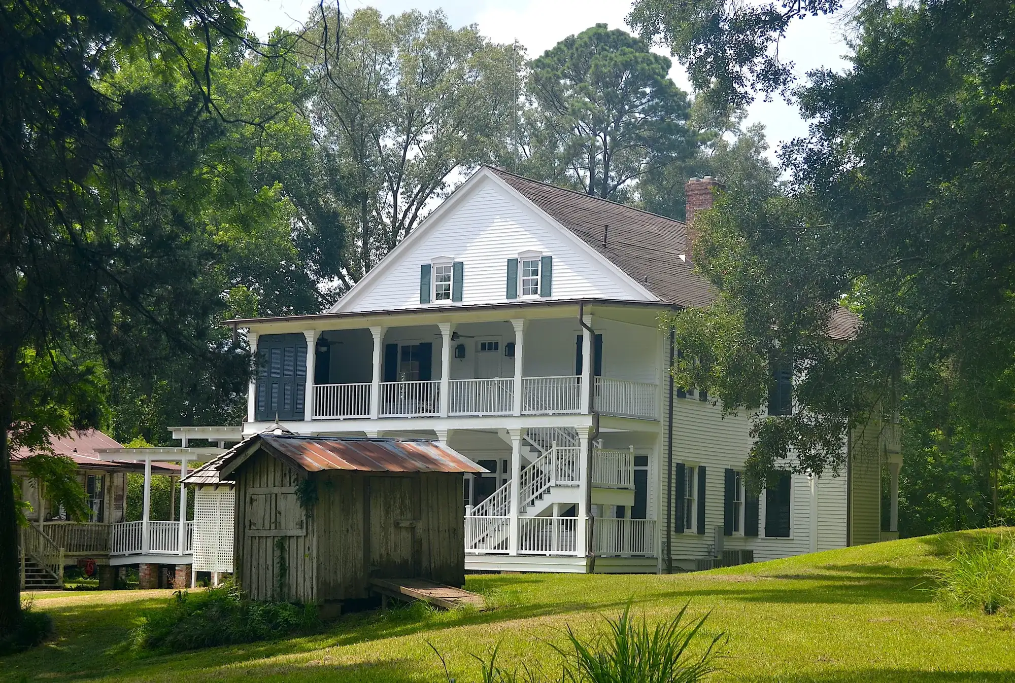 The home and its outbuildings
