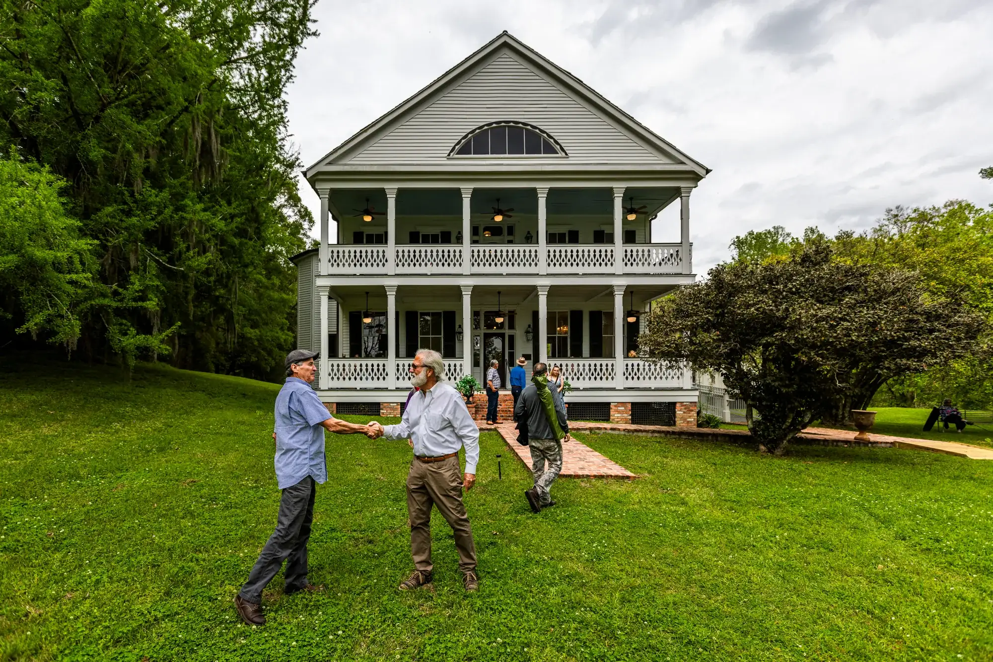 Guests on the lawn at Como Retreat